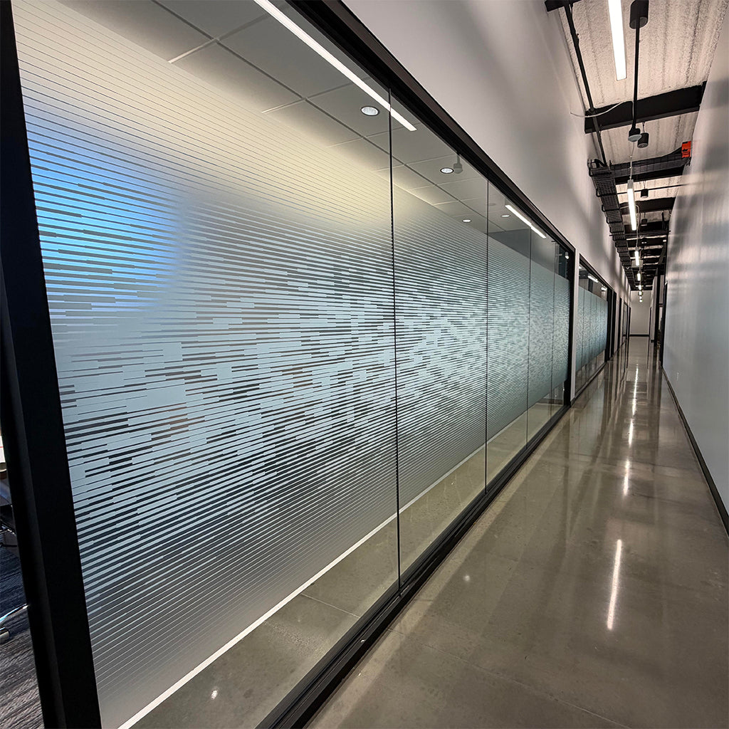 Modern office hallway with gradient frosted glass window film.